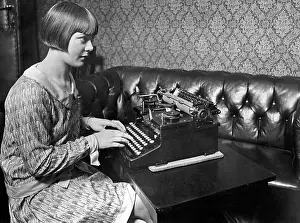 Typing: Secretary with Torpedo typewriter, 20's