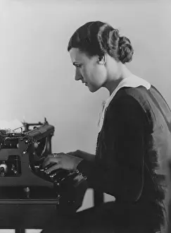 Typing: Secretary with a typewriter, 1936