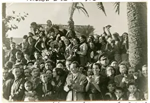 Honouring: A section of the crowd honouring the brigaders