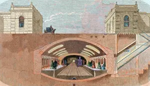 Upstairs: Section of a London Underground station. England. Colored en