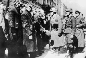 Identifies: Security Service(SD) officials interrogate Jews in Warsaw, 1