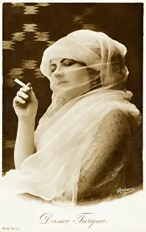 Glancing: A Seductive Turkish Beauty smoking