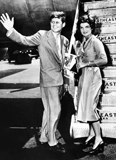 Bouvier: Sen. John Kennedy, waves as he and his fianc?e, ?