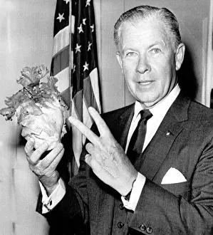 Doubled: Senator George Murphy of California demonstrates ?
