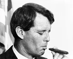 Moyers: Senator Robert Kennedy eyes a cigar. He ?