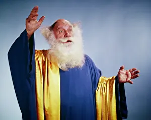 Clairvoyant: Senior Man Character with White Beard Long Blue