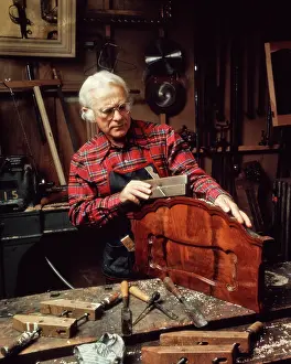 Ban001: Senior Man Plaid Shirt Woodworking Workshop Using Tool