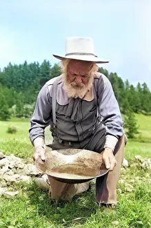 Singular: Senior Man Prospector Panning