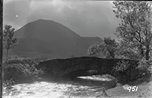 Flowing: Serene Mountain Bridge