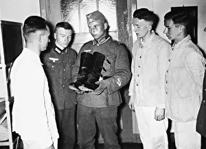 Polished: A sergeant shows polished boots to recruits