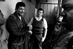 Confrontational: Sergeant Stander (centre) tries to establish who is