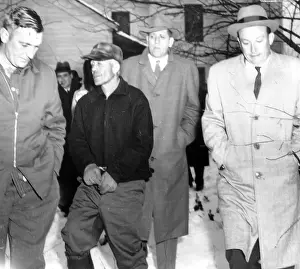 Plainfield: Serial Killer Ed Gein is led away from his ?
