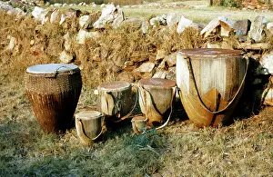 Ganda: Set of laced drums, Ganda, International Library