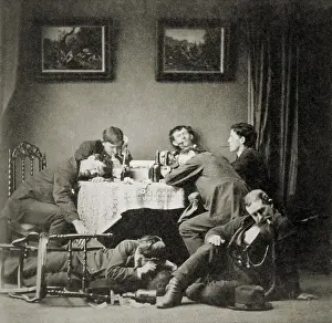 Intoxicated: Seven drunk young men around table and on