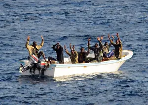 Busted: Seven suspected pirates with hands raised ?