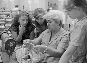 Seamstress: Sewing machine operator A. Arestova