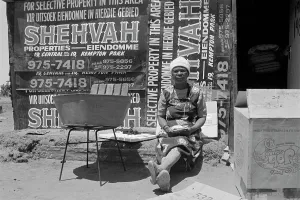 Neighbourhoods: Shack made with property boards at Varkfontein