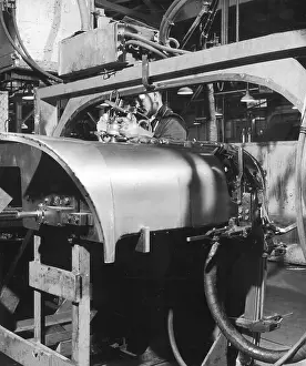 Heinz Zinram: Shaping a car bonnet in a factory