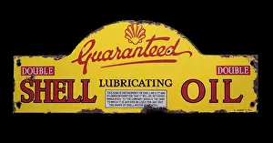 Guaranteed: Shell Lubricating Oil sign