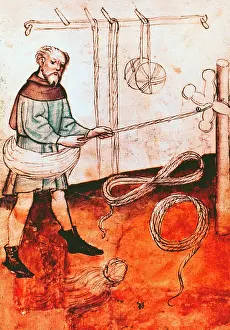 Tense: Shepherd spinning wool