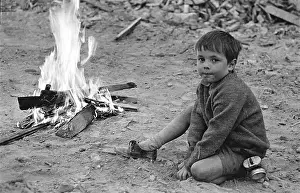 Tyley: Shepherds Bush London, boy with fire on demolition site