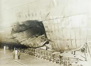 Rivets: Ship in dry dock with damaged hull
