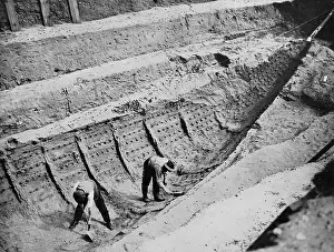 Archaeologists: Ship-grave of an Anglo-Saxon warrior, Sutton Hoo