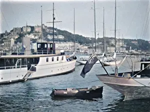 John Maclellan: Ships and boats in a harbour