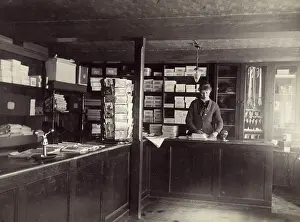 Rotating: Shop interior with female assistant, USA