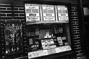 Headaches: Shop window displaying patent medicines