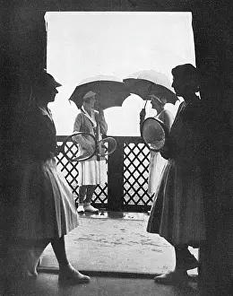 Sportswomen: A shower during a tennis match, 1932