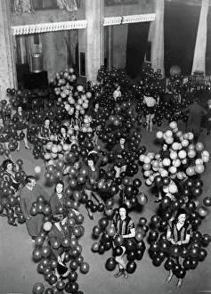 Abut: Showgirls with balloons as decorations