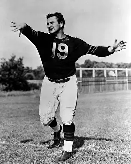 Quarterback: Sid Luckman (1916-1998), quarterback for ?