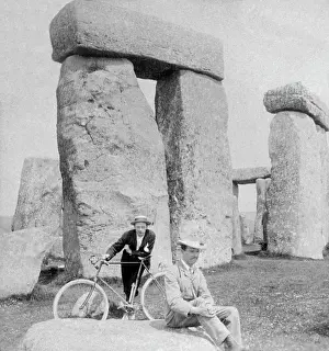 Sightseer: Two sightseers at Stonehenge, Wiltshire