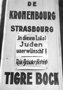 Forbidden: Sign outside a pub forbidding entry to Jews, Strasbourg, Als