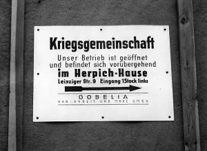 Informs: Sign of a relocated business, 1943