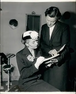 Borrowed: Signing for a hat at the Hat Library