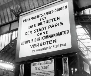 Signpost: A signpost for the German city command at a