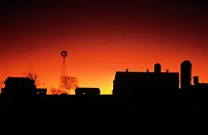 Mid Atlantic: Silhouetted Anonymous Farm Buildings at Sunset Georgetown
