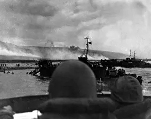 Lcgr1402: Silhouetted by helmets, view shows two landing