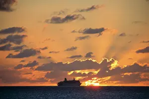 Deg002: Silhouetted Passenger Ship at Sunset