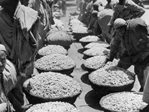 Kashmir: Silkworm cocoons at an Indian market, 1930