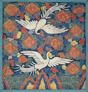 Highlighted: Two silver birds flying amongst stylised clouds
