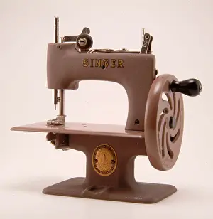 Stitching: Singer Model 20 miniature sewing machine for children