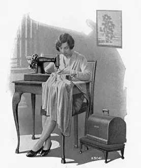 Dressmaker: Singer Sewing Machine - hand machine model