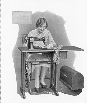 Dressmaker: Singer Sewing Machine - one-drawer drop-leaf table