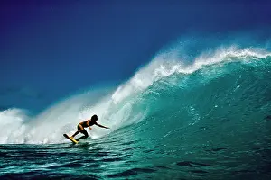 Surfer: Single Anonymous Man Surfer on China Wall