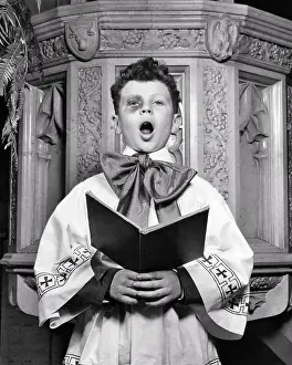 Choirboy: Single Choirboy with Black Eye Singing Loud Looking