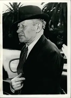 Summons: Sir Eugene Goossens, conductor, in Australia