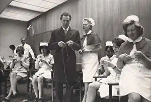 Arthritis: Sir Keith Joseph, Conservative politician, knitting